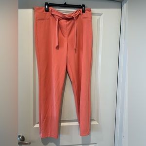 Xl stretchy pants cute front when tied. Pockets are for show only
